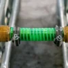 ibc-container-wit-1000L-gereinigd-palet-metaal-kunststof-detail-koppelkit.webp